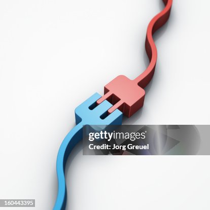 Two cables being connected Two cables being connected