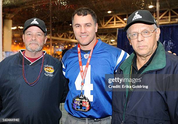 Colts placekicker Adam Vinatieri , a 4-time Super Bowl champion, poses with NFL Extra Points Credit Card member and winner of Super Bowl XLVII...