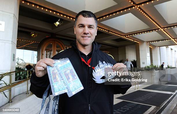 Colts placekicker Adam Vinatieri, a 4-time Super Bowl champion, prepares to award a pair of Super Bowl tickets to a lucky fan on behalf of...