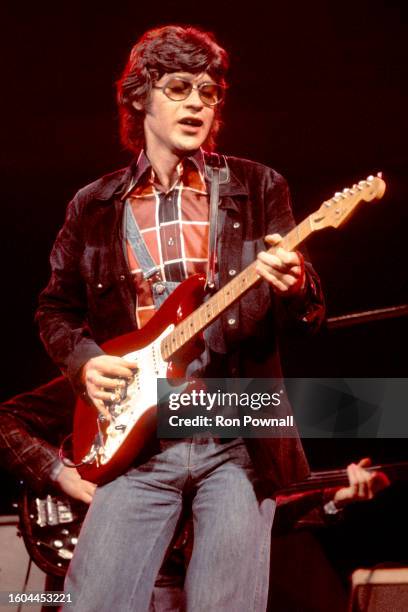 Robbie Robertson performs with The Band at the Boston Music Hall on September 2, 1976 in Boston, Massachusetts.