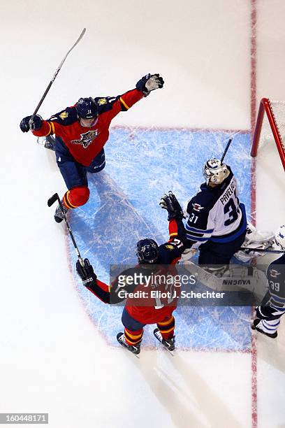 Jonathan Huberdeau of the Florida Panthers celebrates his goal with teammate Jack Skille against the Winnipeg Jets at the BB&T Center on January 31,...