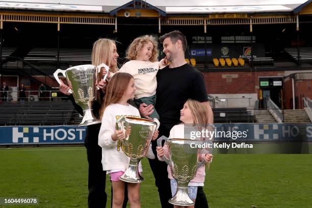 Trent Cotchin poses for a portrait with his wife Brooke and their children Parker, Harper and Mackenzie after announcing his retirement from AFL...