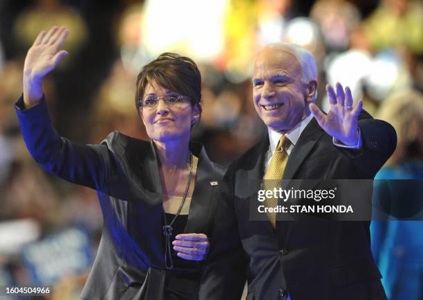 Republican presidential nominee John McCain and his running mate Sarah Palin acknowledge the audience during the finale of the Republican National...