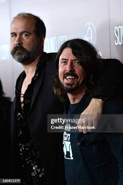 Musician Dave Grohl and Krist Novoselic arrive at the Premiere Of "Sound City" at ArcLight Cinemas Cinerama Dome on January 31, 2013 in Hollywood,...