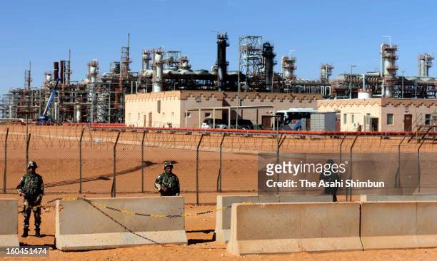 Algerian Army soldiers stand guard at the natural gas plant, recent hostage crisis site, on January 31, 2013 in In Amenas, Algeria. Thirty-seven...