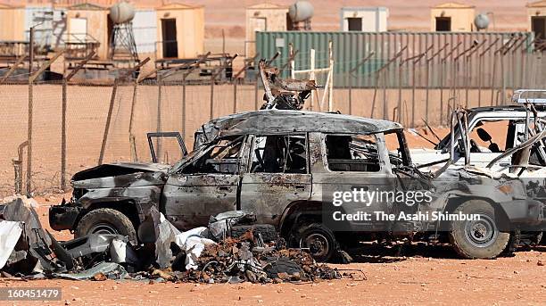 Burnt vehicle remains on a roadside between residential area and the gas plant on January 31, 2013 in In Amenas, Algeria. Thirty-seven foreign...