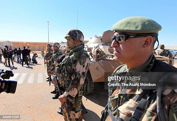 Algerian Army soldiers stand guard at the enterance gate of the residential area on January 31, 2013 in In Amenas, Algeria. Thirty-seven foreign...