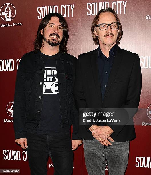 Dave Grohl and Butch Vig attend the premiere of "Sound City" at ArcLight Cinemas Cinerama Dome on January 31, 2013 in Hollywood, California.