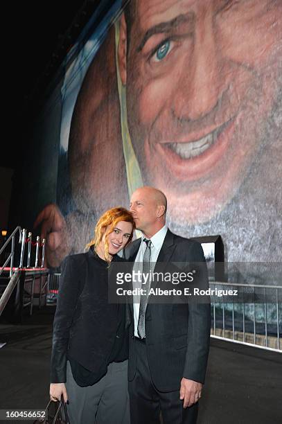 Actress Rumer Willis and actor Bruce Willis attends the dedication and unveiling of a new soundstage mural celebrating 25 years of "Die Hard" at Fox...