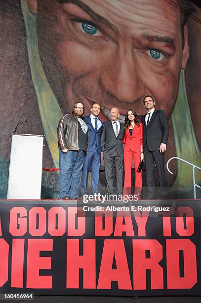 Director John Moore, actors Jai Courtney, Bruce Willis, Julia Snigir and Rasha Bukvic attend the dedication and unveiling of a new soundstage mural...