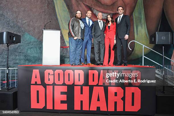 Director John Moore, actors Jai Courtney, Bruce Willis, Julia Snigir and Rasha Bukvic attend the dedication and unveiling of a new soundstage mural...