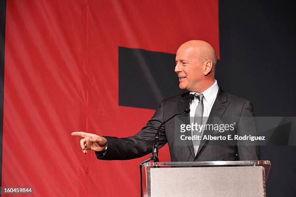 Actor Bruce Willis attends the dedication and unveiling of a new soundstage mural celebrating 25 years of "Die Hard" at Fox Studio Lot on January 31,...