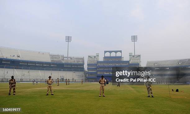 Police officers guard the pitch before the start of the second match of ICC Womens World Cup between Australia and Pakistan, played at the Barabati...