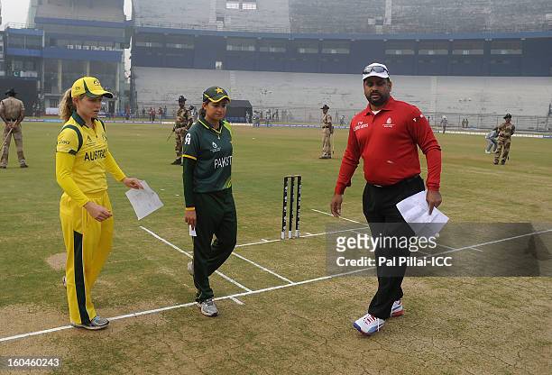 Australia captain Jodie Fields and Pakistan captain Sana Mir during the toss before the start of the second match of ICC Womens World Cup between...