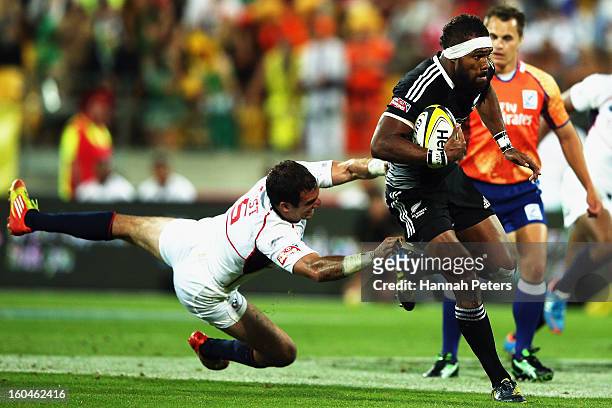 Lote Raikabula of the All Blacks Sevens makes a break during the Pool A match between New Zealand and the United States during the 2013 Wellington...