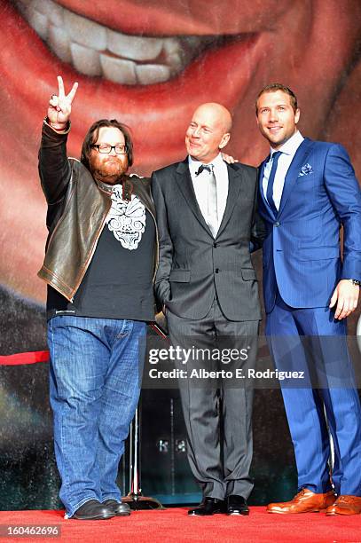 Director John Moore, actor Bruce Willis and actor Jai Courtney attend the dedication and unveiling of a new soundstage mural celebrating 25 years of...