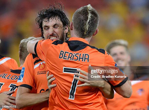 Besart Berisha and Thomas Broich of the Roar celebrate a goal during the round 19 A-League match between the Brisbane Roar and the Central Coast...