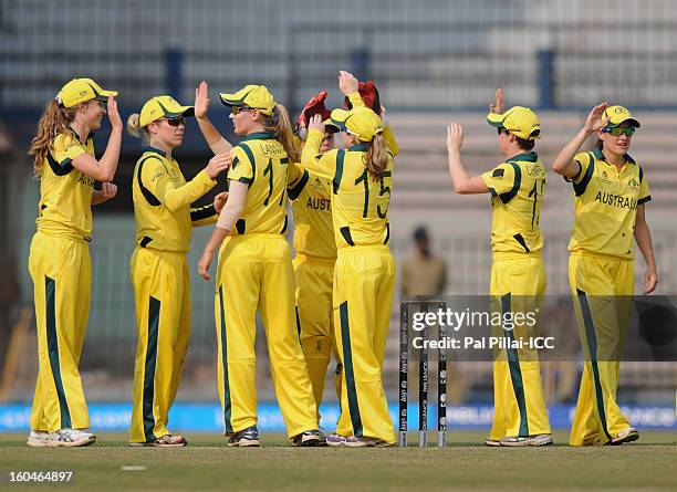 The Australia team celebrate after winning the second match of ICC Womens World Cup between Australia and Pakistan, played at the Barabati stadium on...