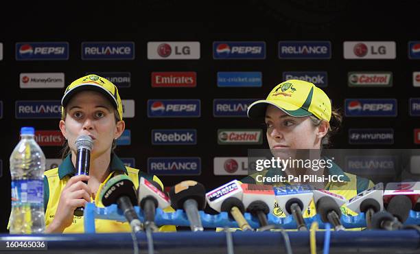 Jodie Fields captain of Australia addresses a press conference with team-mate Sarah Coyte at the end of second match of ICC Womens World Cup between...