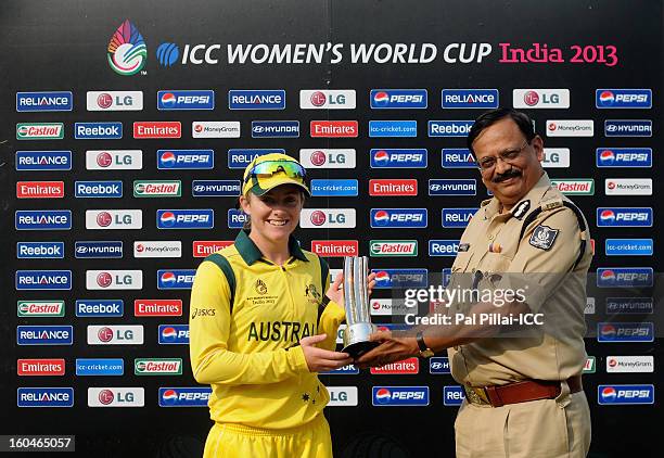 Sarah Coyte of Australia receives the woman of the match award during the second match of ICC Womens World Cup between Australia and Pakistan, played...