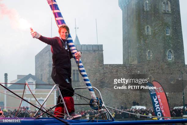Sailor Francois Gabart arrives in port after winning the Vendee Globe 2013 record with his boat Macif on January 27, 2013 in Sables d'Olonne,France....