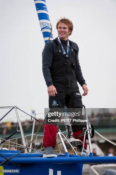 Sailor Francois Gabart arrives in port after winning the Vendee Globe 2013 record with his boat Macif on January 27, 2013 in Sables d'Olonne,France....