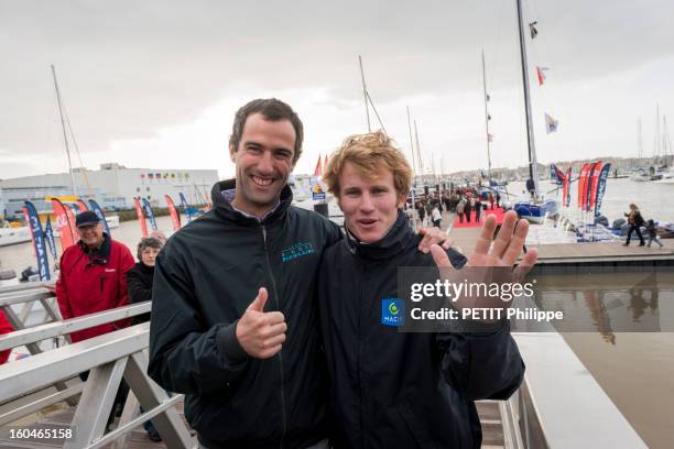 Sailor Francois Gabart with Armel Le Cleac'h after arriving in port after winning the Vendee Globe 2013 record with his boat Macif on January 27,...