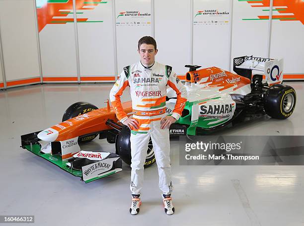 Sahara Force India Formula 1 driver Paul Di Resta of Great Britain with the team's new car for the 2013 Formula 1 season, the VJM06, during the...