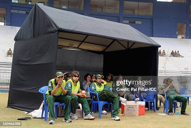 Players from Pakistan team relax during the second match of ICC Womens World Cup between Australia and Pakistan, played at the Barabati stadium on...