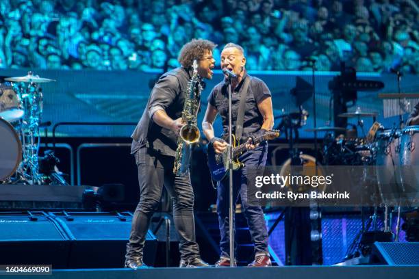 Jake Clemons and Bruce Springsteen perform during the opening night of their North American tour at Wrigley Field on August 9, 2023 in Chicago,...