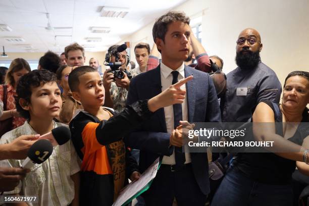 French Education and Youth Minister Gabriel Attal attends the first day of school at the middle school Bourbon in Saint-Denis, on the island of la...