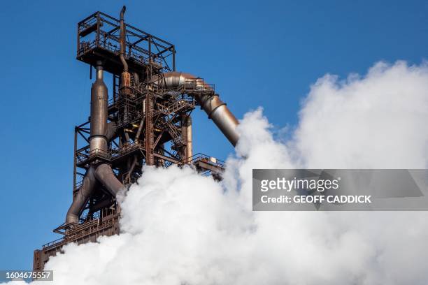 Photograph shows blast furnace number five at the Tata Steel Port Talbot integrated iron and steel works in south Wales on 15 August, 2023. Port...