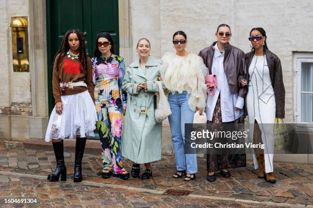 Group of guests outside Marimekko during the Copenhagen Fashion Week Spring/Summer 2024 on August 09, 2023 in Copenhagen, Denmark.