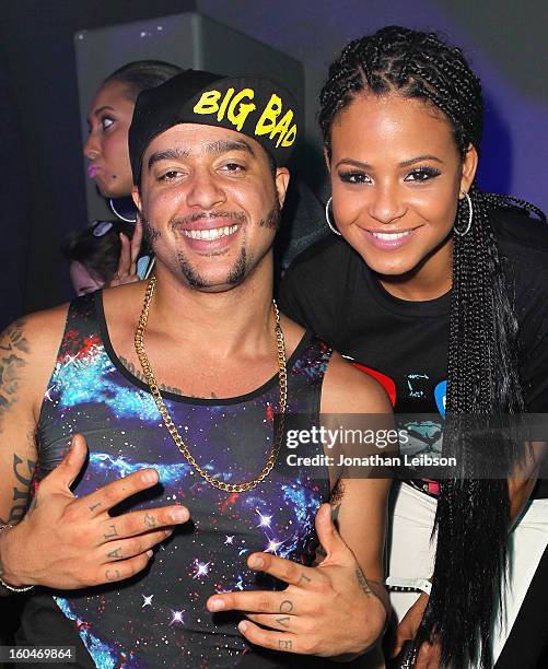 SkyBlu and Christina Milian pose at the SkyBlu "Pop Bottles" Single Release Party at Lure on January 31, 2013 in Hollywood, California.