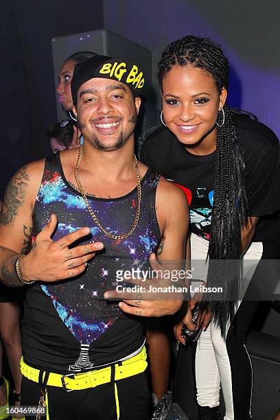 SkyBlu and Christina Milian pose at the SkyBlu "Pop Bottles" Single Release Party at Lure on January 31, 2013 in Hollywood, California.