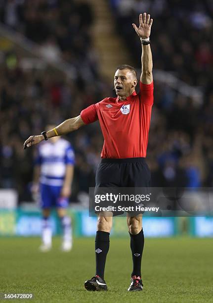 Referee Mark Halsey signals during the Barclays Premier League match between Reading and Chelsea at Madejski Stadium on January 30, 2013 in Reading,...