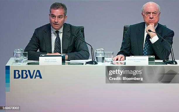 Angel Cano, president and chief operating officer of Banco Bilbao Vizcaya Argentaria SA , left, speaks as Francisco Gonzalez, chairman of Banco...