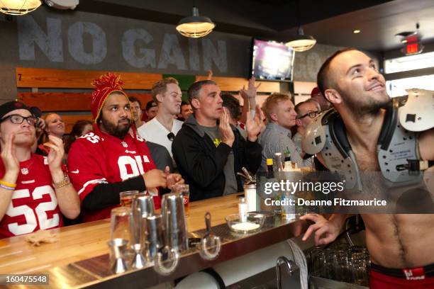 Portrait of San Francisco 49ers fans watching the NFC Championship game at Hi Tops in the Castro District. Hi Tops is the city's first official gay...