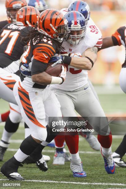 Chase Blackburn of the New York Giants makes the play during the game against the Cincinnati Bengals at Paul Brown Stadium on November 11, 2012 in...