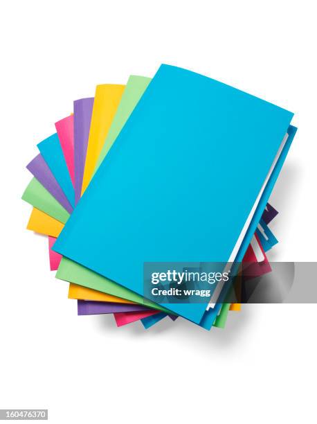 blue file on the top of a pile - ring binder 個照片及圖片檔