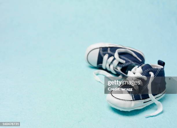 little blue booties - baby blue stock pictures, royalty-free photos & images