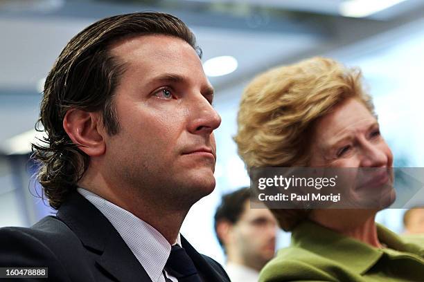 Actor Bradley Cooper, star of "Silver Linings Playbook", and Senator Debbie Stabenow attend the "Silver Lining Playbook" Mental Health Progress Press...