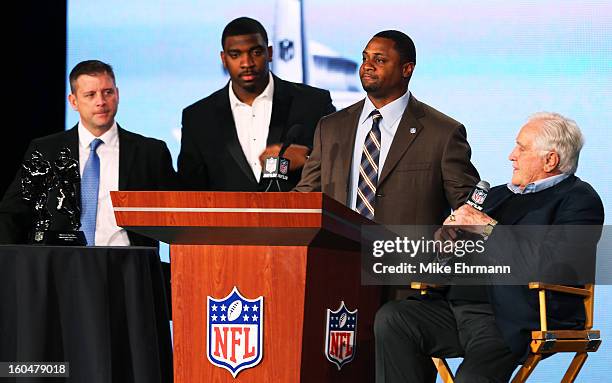 Vice President of Player Engagement Troy Vincent , Greg Scruggs of the Seattle Seahawks, and Former Miami Dolphins head coach Don Shula present Head...