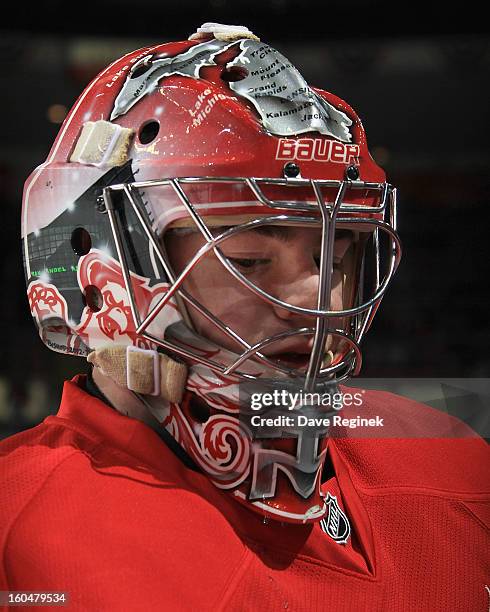 Tom McCollum of the Detroit Red Wings skates around in warm-ups before an NHL game against the Dallas Stars at Joe Louis Arena on January 25, 2013 in...