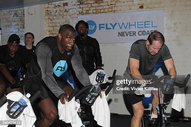 Former NFL player Shannon Sharpe and former NFL Coach Bill Cowher attend The Flywheel Challenge at the NFL House hosted by Shannon Sharpe at The...