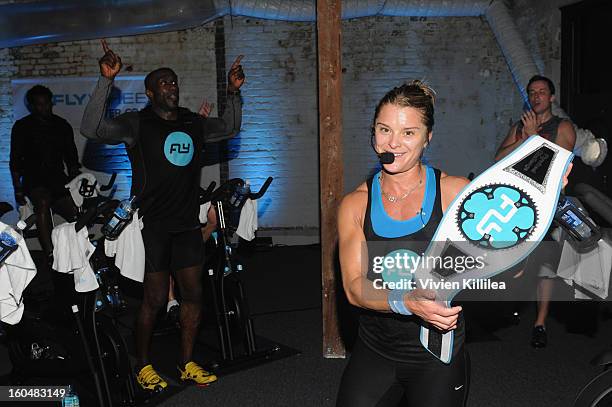 Former NFL player Shannon Sharpe and trainer Holly Rilinger attend The Flywheel Challenge at the NFL House hosted by Shannon Sharpe at The Chicory on...