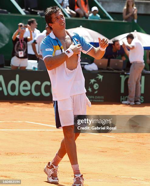 Carlos Berlocq celebrates after defeating Philipp Kohlschreiber in the opening match of the series between Argentina and Germany in the first round...