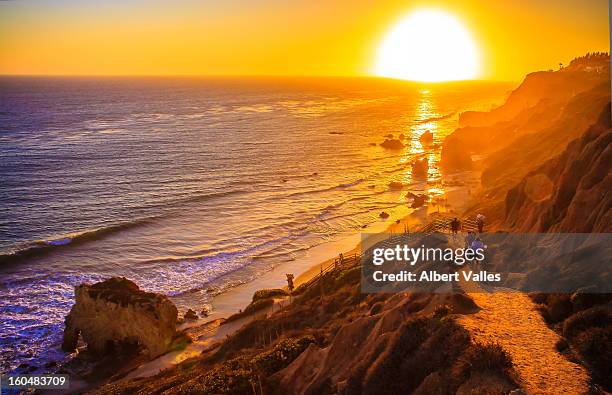 going to enjoy the autumn sunset! - malibu stockfoto's en -beelden