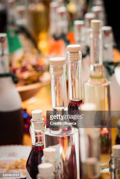italian liquor bottles - grappa stockfoto's en -beelden