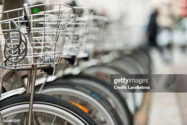 ecological transport - bicycle parking station stock pictures, royalty-free photos & images